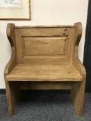 A reclaimed pine hall seat