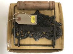 A metal toilet roll holder