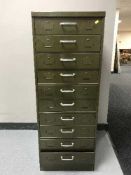 A metal ten drawer dentists filing chest