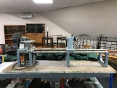 A Elu lathe and a plastic dumpy bin of wood