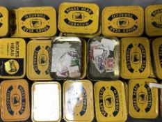 A large quantity of Boars head tobacco tins of loose stamps