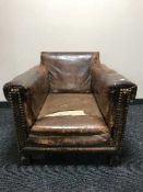 A 19th century brown button leather club armchair