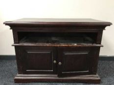 A mahogany effect entertainment unit