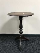 A Victorian tripod table
