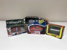A tray of sixteen assorted boxed die cast vehicles inc.