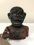 A cast iron money bank