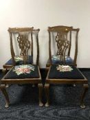 A set of four mahogany dining chairs