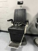 A mid 20th century electric hydraulic chair
