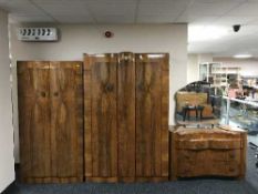 A three piece walnut bedroom suite