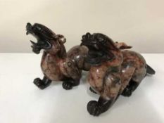 A pair of oriental soapstone dragons in box
