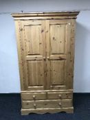 A pine double door wardrobe