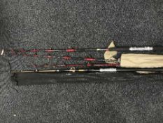 A Giant rod bag containing fishing rid stand and six assorted rods