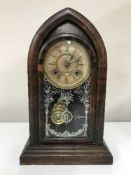 A late 19th century Tudor American mantel clock