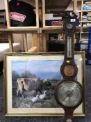 An antique inlaid mahogany banjo barometer and a gilt framed print depicting a girl on a farm