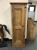 A reclaimed pine single door cupboard