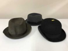 A bowler hat by Christies of London together with three trilby hats