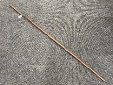 A 19th century African spear head, upon a later haft, length 176cm.
