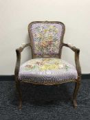 A tapestry upholstered armchair