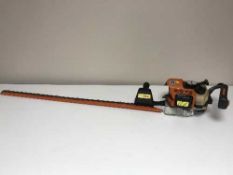 A Stihl HS 85 petrol hedge trimmer