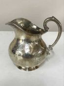 A sterling silver jug