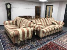 A near pair of high quality contemporary settees by Peter Gill upholstered in striped fabric with