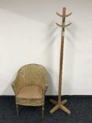 A gold loom chair and a hat & coat stand