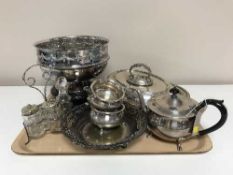 A tray of large plated rose bowl on wooden stand, cruet set, plated tea service,
