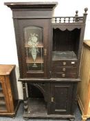 A continental oak arts and crafts style cabinet