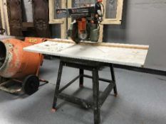 A Dewalt Powershop table saw on stand