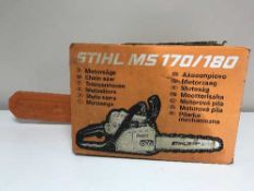 A boxed Stihl MS170-180 petrol chain saw