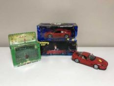 A tray of two large scale die cast Ferraris,