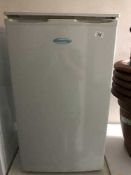 Snow White under bench fridge