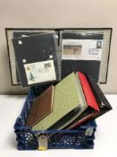 Four albums of first day covers and an album of stamps