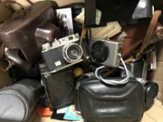 Two boxes of cameras and lens,