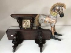 Two mahogany wall shelves and a miniature wooden rocking horse