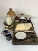 A cased brush set, hot water bottle and flagon, copper lustre jug, tankards,