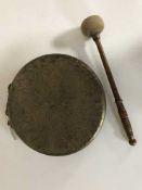 A brass gong with beater