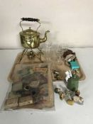A tray of early 20th century etched glass water jug, brass spirit kettle on stand, pipes,