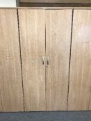 A double door office stationary cupboard,