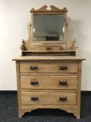 A late Victorian satin walnut dressing table with mirror