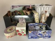 A box of assorted toiletries, wicker bin, door stop,