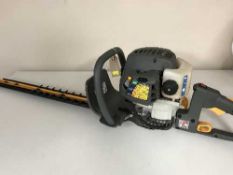 A Ryobi petrol hedge trimmer
