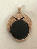 A vintage 9ct gold swivel fob