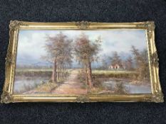 A large gilt framed oil on canvas - path through rural landscape signed I.