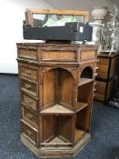 An unusual Victorian oak octagonal shop cabinet by Howard & Sons of Cleveland,