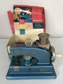 A mid 20th century boxed Vulcan Junior toy sewing machine