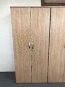 A double door office stationary cupboard,