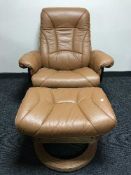 A brown leather relaxer chair and stool