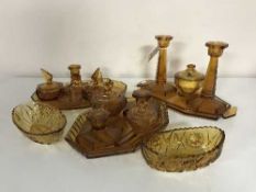 Three amber glass trinket sets and two bowls