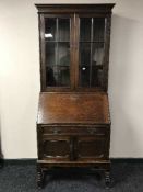An Edwardian oak bureau bookcase